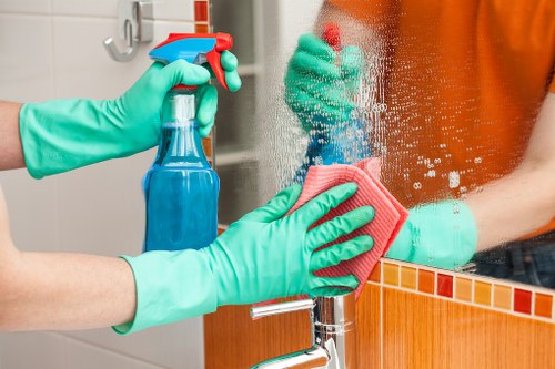 Cleaner in E8 providing professional home cleaning