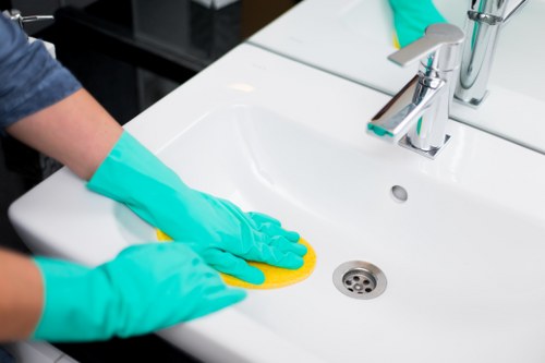 Kitchen and bathroom deep cleaning in E8 with detailed surface care