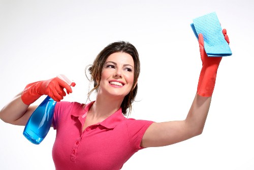 Reviewing carpet cleaning complaint details on a clipboard